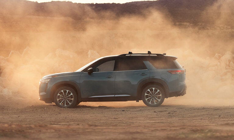 2026 Nissan Pathfinder side view in dust