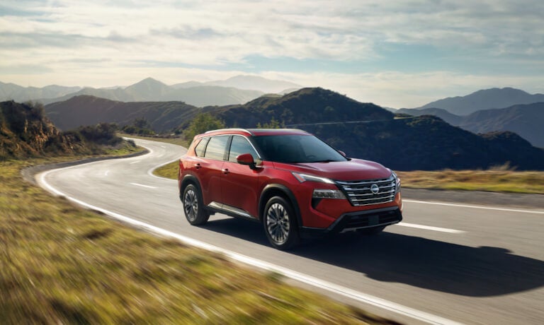 2026 Nissan Rogue driving in hills