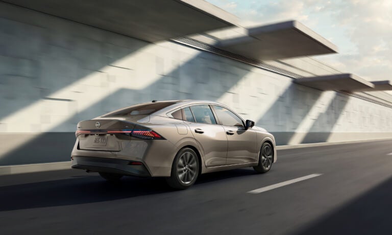 2026 Nissan Sentra driving fast by wall